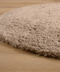 Teppich Oval Hochflor - Cozy Shaggy Beige - close up zijkant