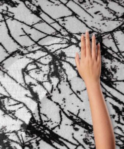 Waschbarer Teppich Rund Marmor Optik - Chloé Weiß/Schwarz Waschbarer Teppich Rund Marmor Optik - Chloé Weiß/Schwarz