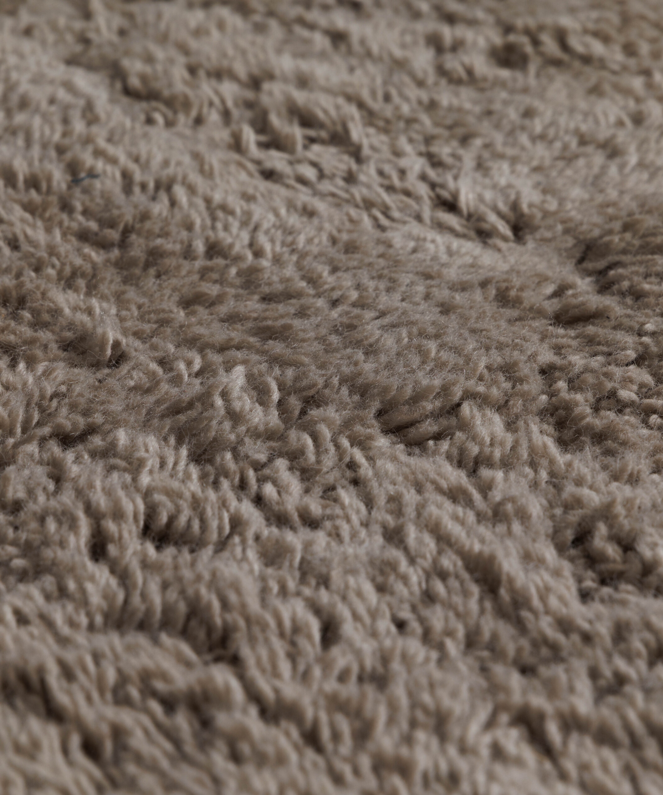 Organischer Teppich - Tjørne Swell Taupe - close up Organischer Teppich - Tjørne Swell Taupe - close up