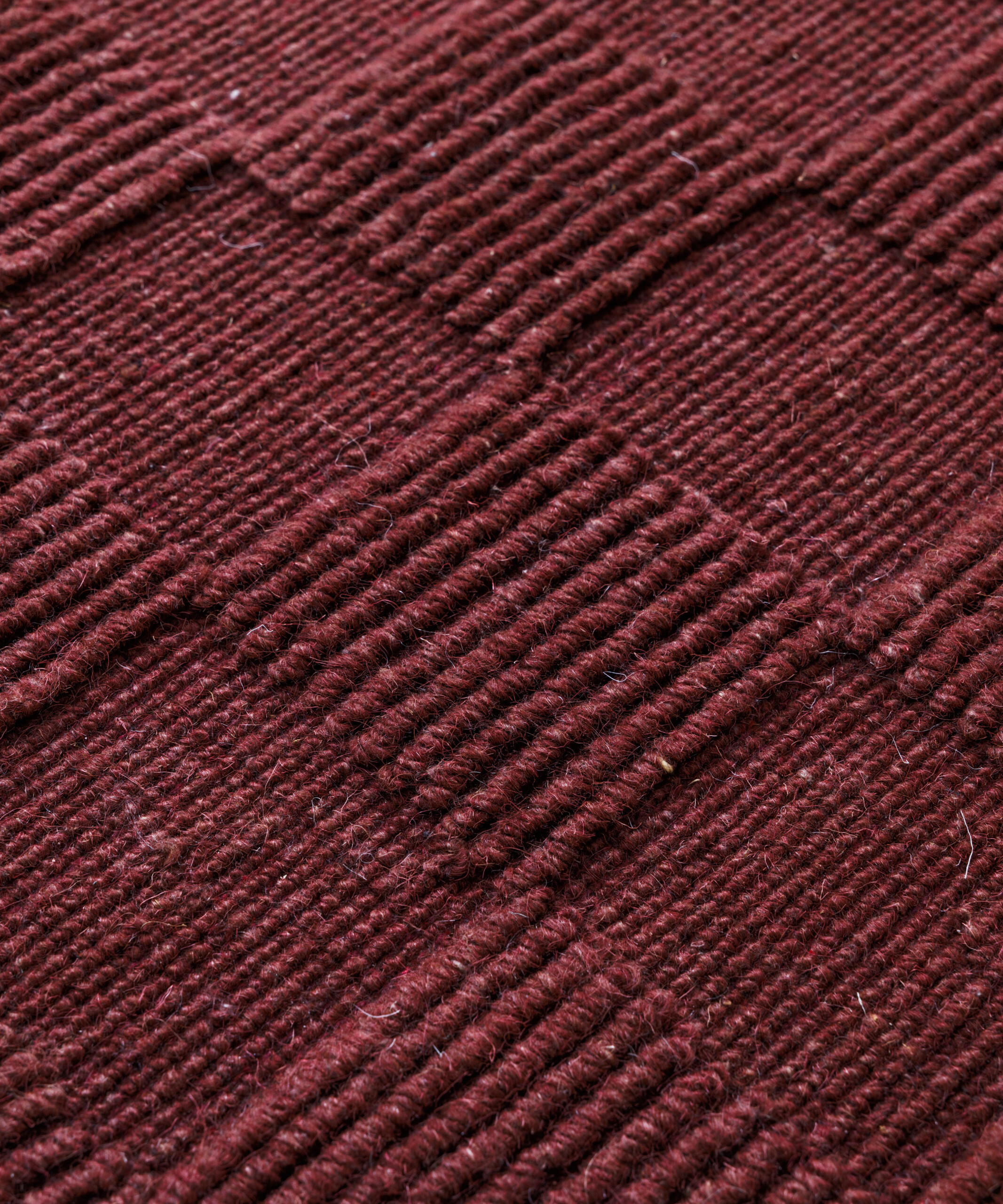 Wollteppich - Tavle Bordeauxrot - close up Wollteppich - Tavle Bordeauxrot - close up
